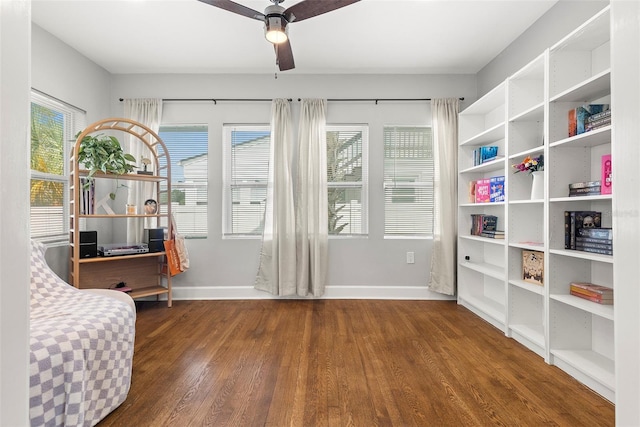 sitting room with a wealth of natural light, hardwood / wood-style floors, and ceiling fan