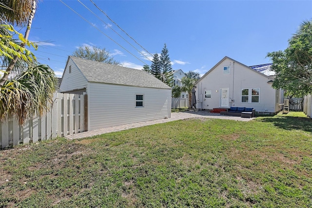 view of yard featuring a fenced backyard, an outdoor living space, and a patio