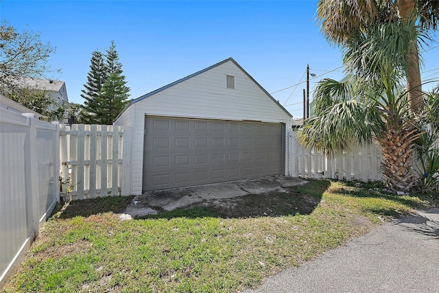 detached garage with fence