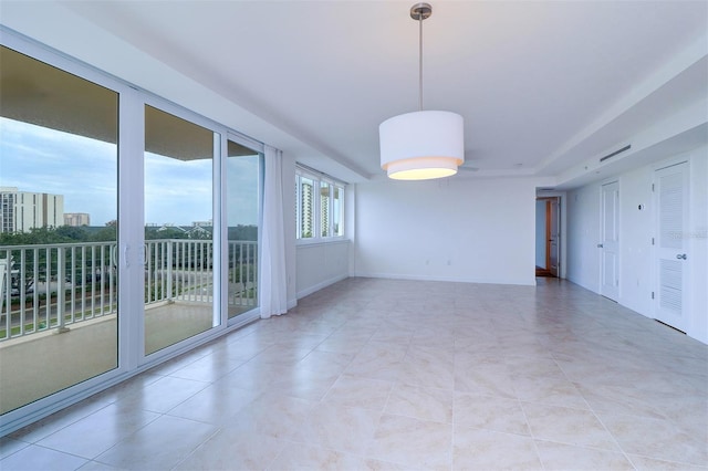 view of tiled spare room