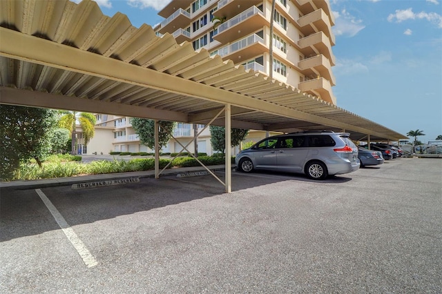 view of parking featuring a carport