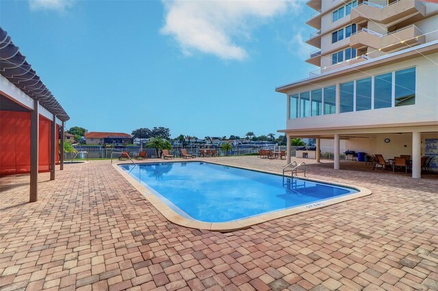 view of pool featuring a patio