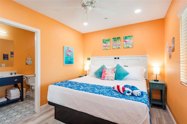 bedroom featuring ceiling fan and light hardwood / wood-style floors