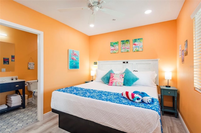 bedroom featuring a ceiling fan, recessed lighting, light wood-style flooring, and baseboards