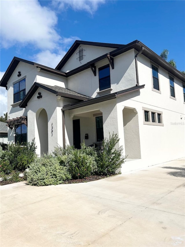 view of front of house featuring stucco siding