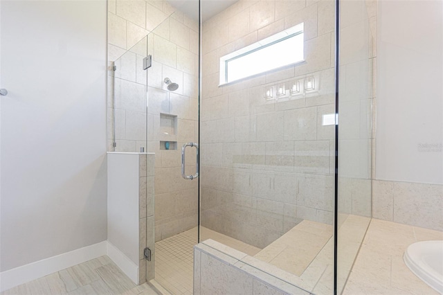 bathroom featuring tile patterned flooring and plus walk in shower