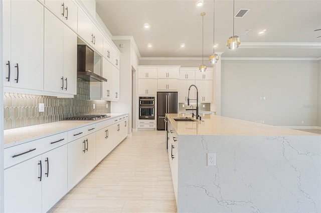 kitchen featuring sink, white cabinets, and stainless steel appliances