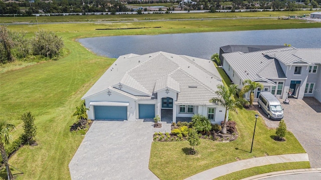 drone / aerial view with a water view