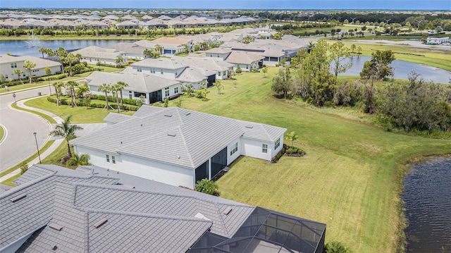 drone / aerial view featuring a water view