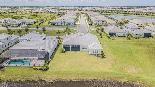 bird's eye view with a water view