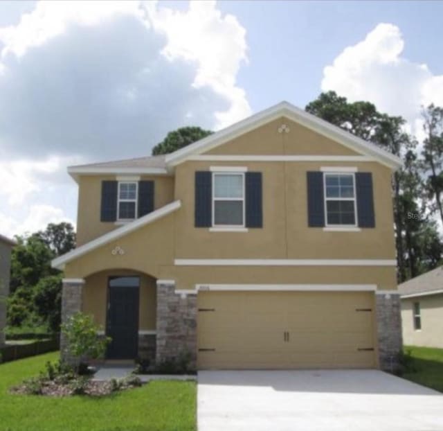 view of front of property featuring a garage