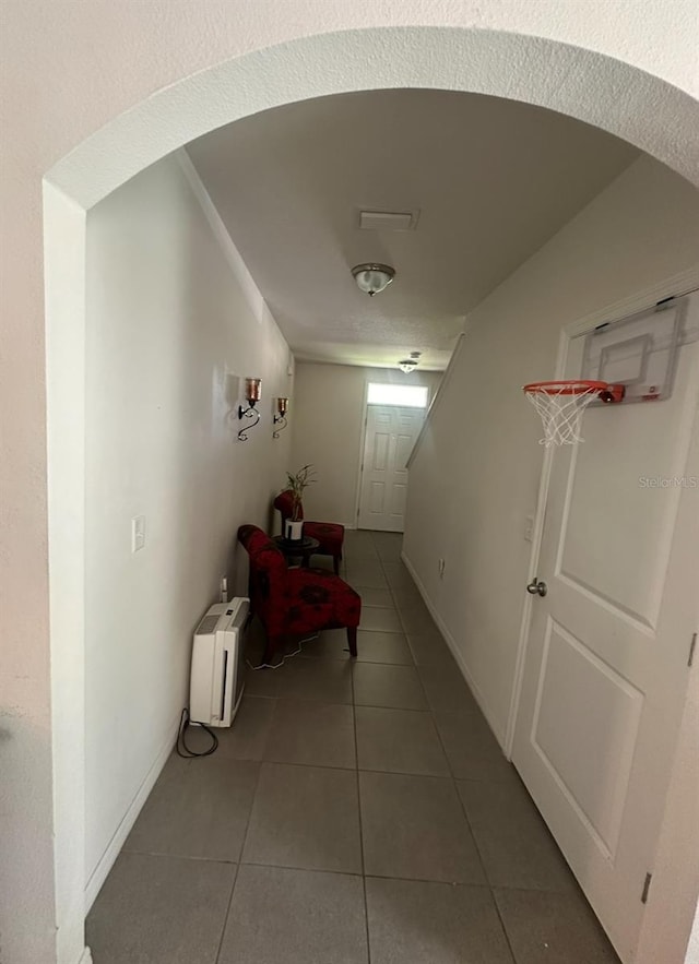 hall featuring tile patterned floors