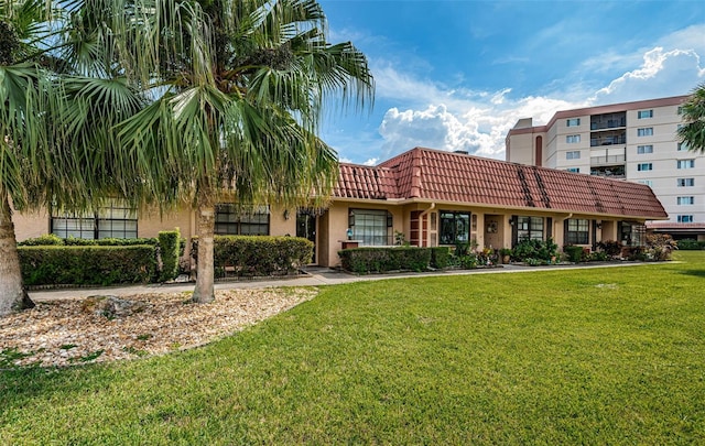 exterior space featuring a front lawn