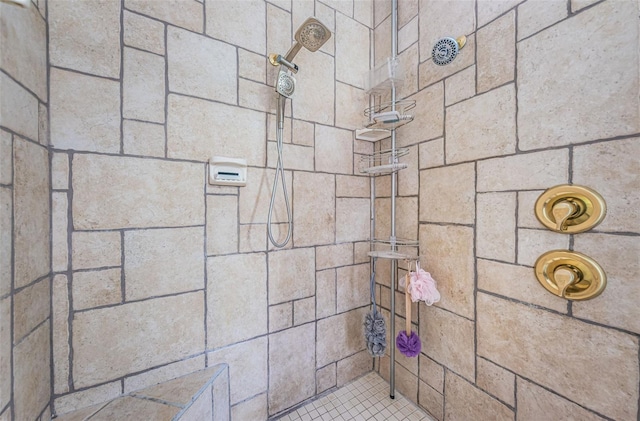 bathroom featuring a tile shower