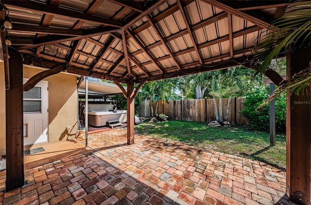 view of patio with a gazebo and a hot tub