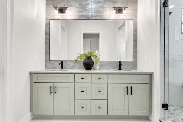 bathroom featuring tasteful backsplash, vanity, and an enclosed shower