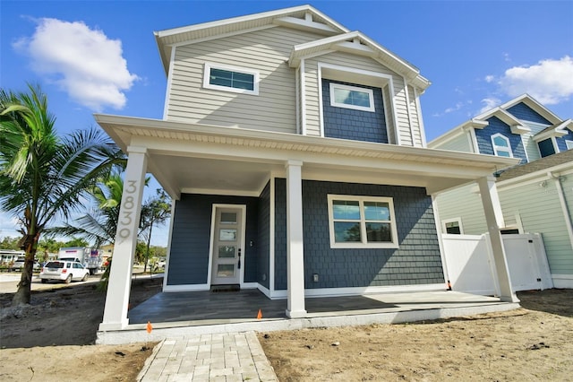 view of front of property featuring covered porch