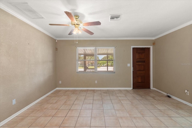 spare room featuring ceiling fan, light tile patterned floors, and crown molding