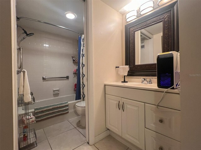 full bathroom with vanity, toilet, shower / tub combo, and tile patterned flooring