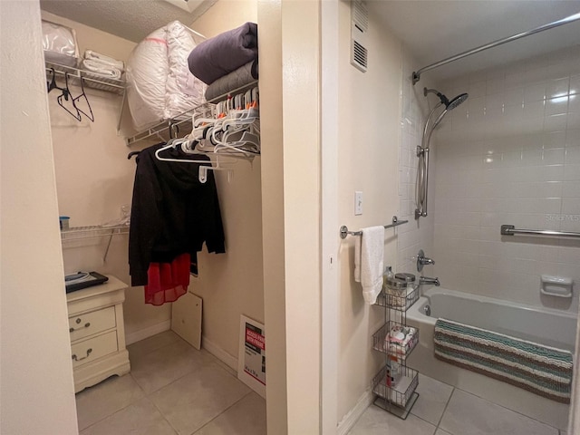 interior space featuring light tile patterned flooring