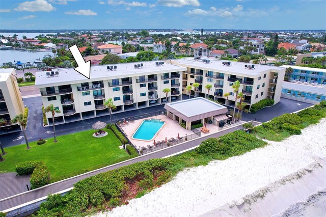 bird's eye view featuring a beach view and a water view