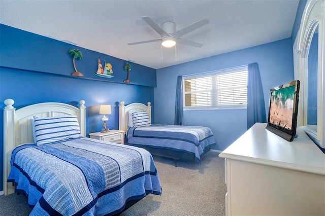 carpeted bedroom featuring a ceiling fan