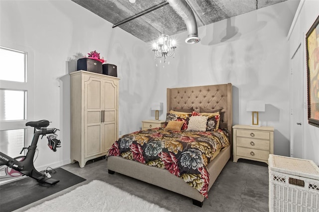 bedroom with an inviting chandelier