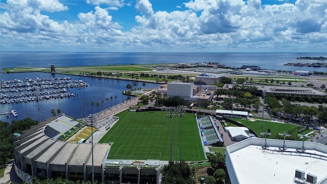 birds eye view of property with a water view