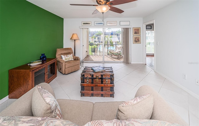 tiled living room with ceiling fan