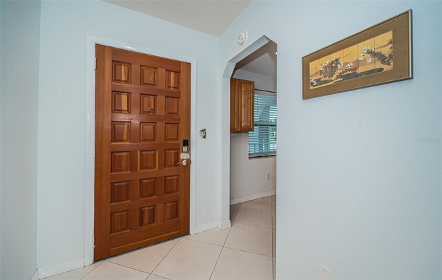 entrance foyer with light tile patterned flooring