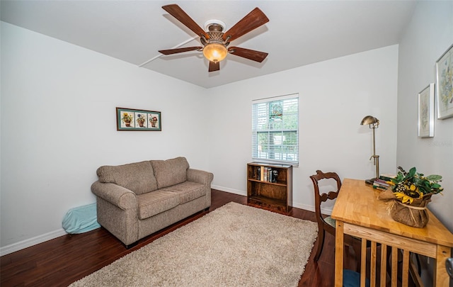 home office featuring ceiling fan and dark wood-type flooring