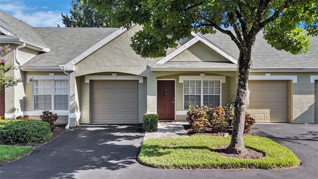 single story home with a garage