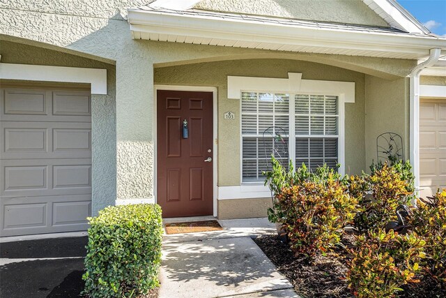 entrance to property with a garage