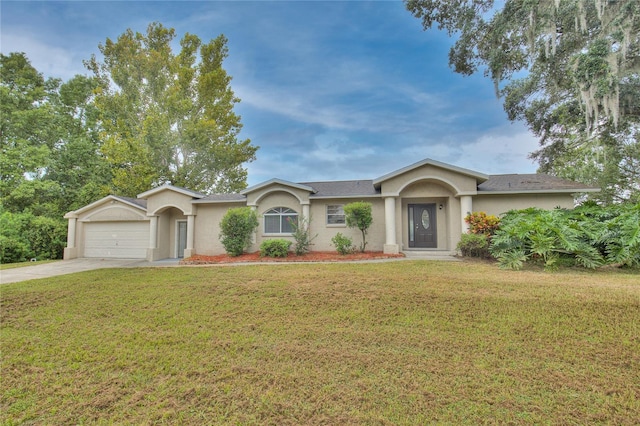 ranch-style house with a garage and a front lawn