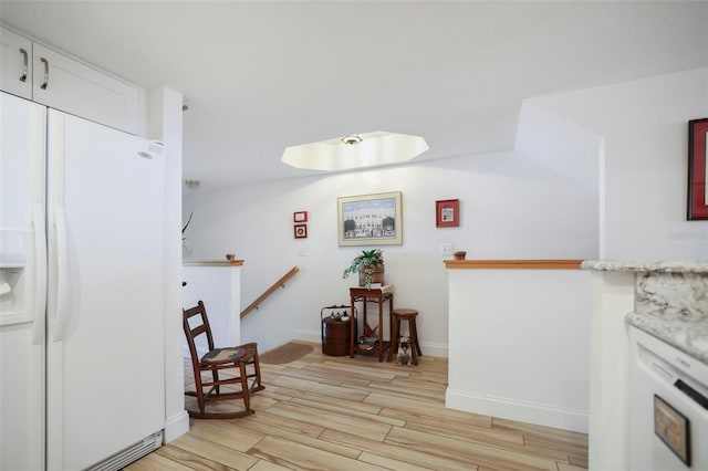 dining area with light wood-type flooring