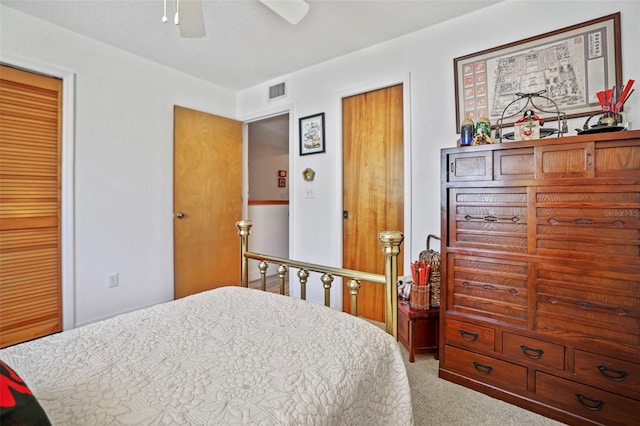 carpeted bedroom featuring ceiling fan