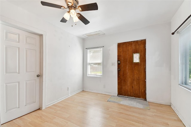 entrance foyer featuring light hardwood / wood-style flooring and ceiling fan