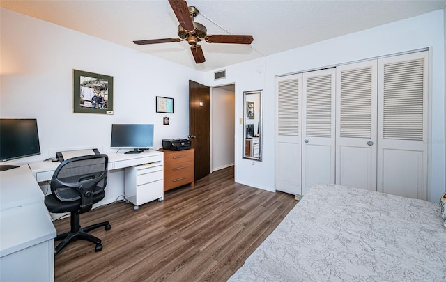 office featuring wood-type flooring and ceiling fan