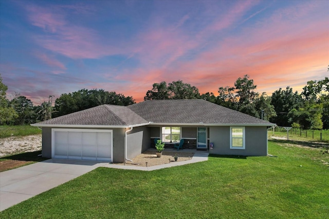 ranch-style home with concrete driveway, covered porch, an attached garage, and stucco siding