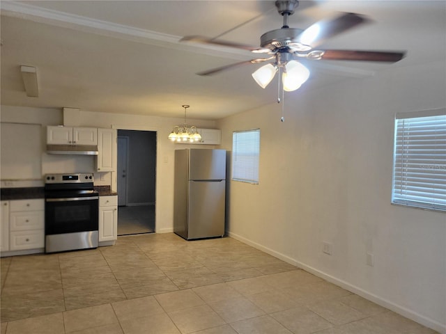 kitchen featuring stainless steel appliances, baseboards, white cabinets, dark countertops, and pendant lighting