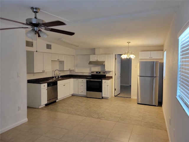 kitchen with stainless steel appliances, visible vents, white cabinets, and under cabinet range hood