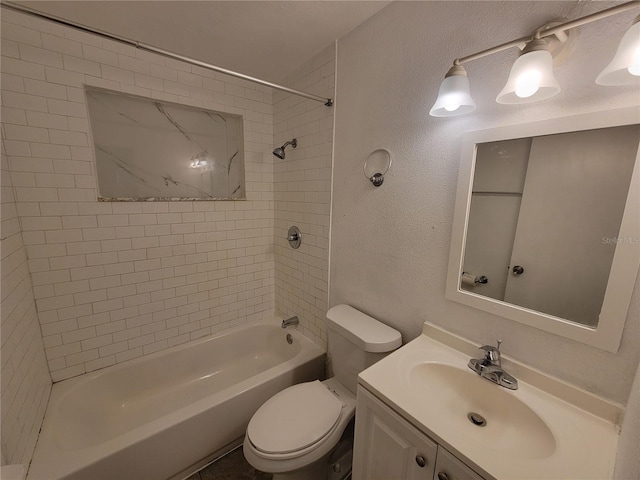 full bathroom with bathtub / shower combination, a textured wall, vanity, and toilet