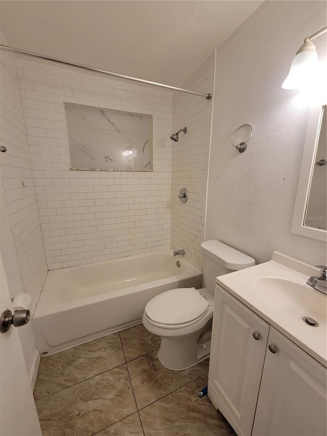 full bathroom with shower / bath combination, a textured wall, vanity, and toilet