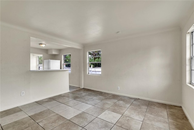 view of tiled spare room