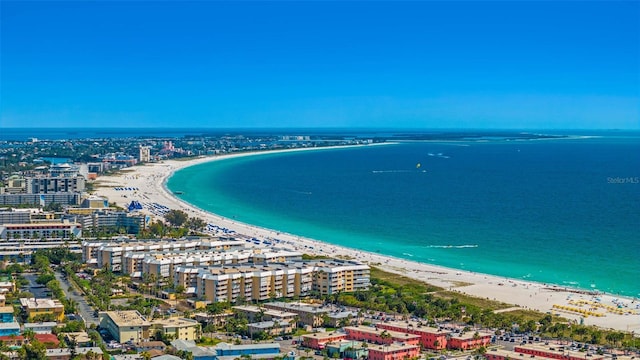 birds eye view of property featuring a view of the beach and a water view