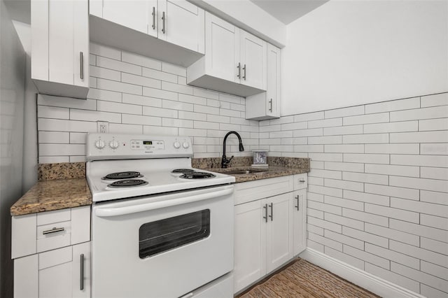 kitchen with sink, hardwood / wood-style floors, electric stove, and white cabinets