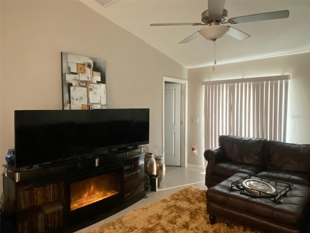 living room with ceiling fan and lofted ceiling