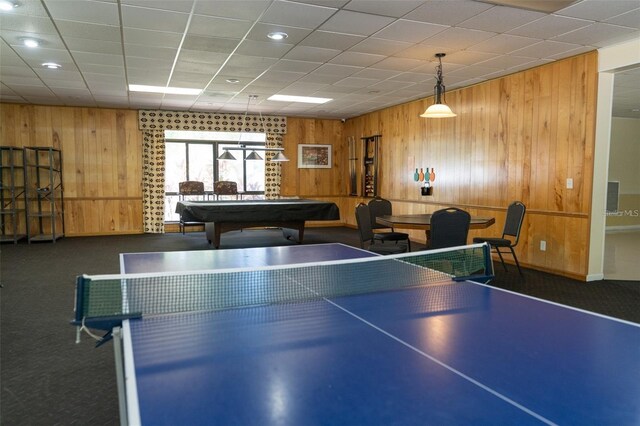 game room featuring wood walls, billiards, and carpet