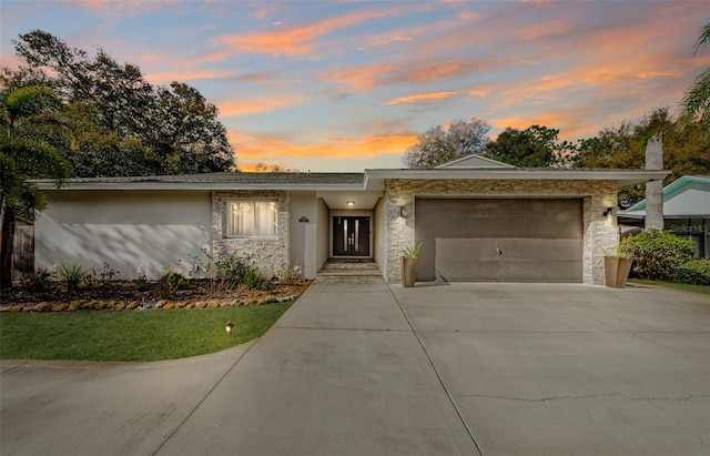 single story home featuring a garage