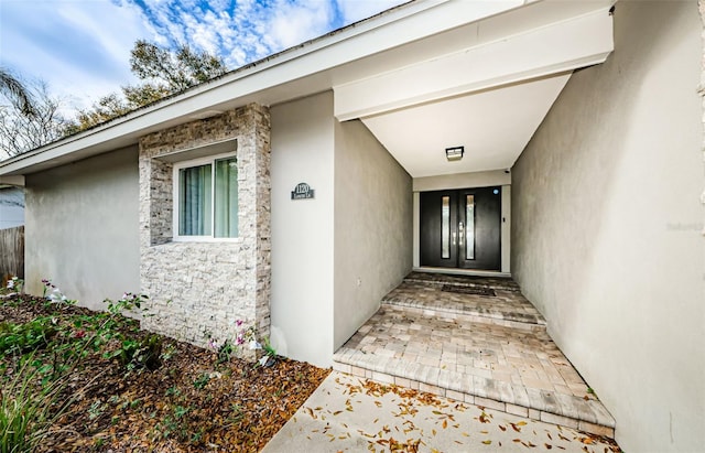 doorway to property with french doors